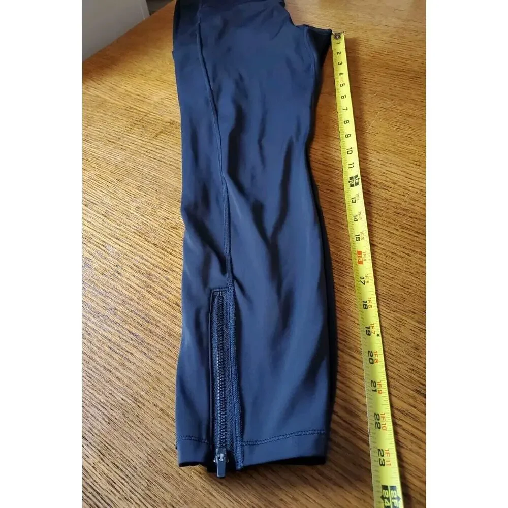 Athleta 7/8 Tight‎ Leggings Medium Black Pockets Ankle Zippers Vented Womens